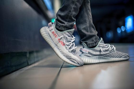 Adidas to sell €1.2bn of unsold Yeezy shoes and donate to charities